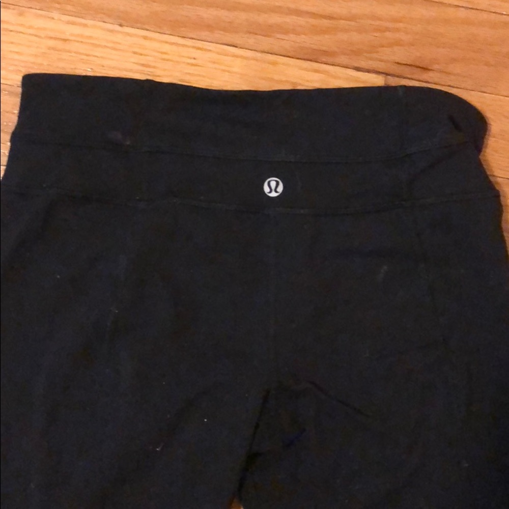 Two lululemon black women’s workout pants